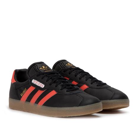 adidas gazelle schwarz rot gold|adidas gazelle icing.